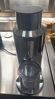 van het de machinehuishouden van de zwartselkoffiemolen de espresso kegel vlakke braam T64